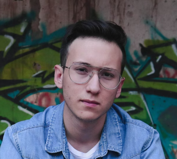 Man in glasses and denim shirt